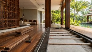Solid wood flooring installation over timber battens in a tropical home, showing the raised floor build-up and fixing method.