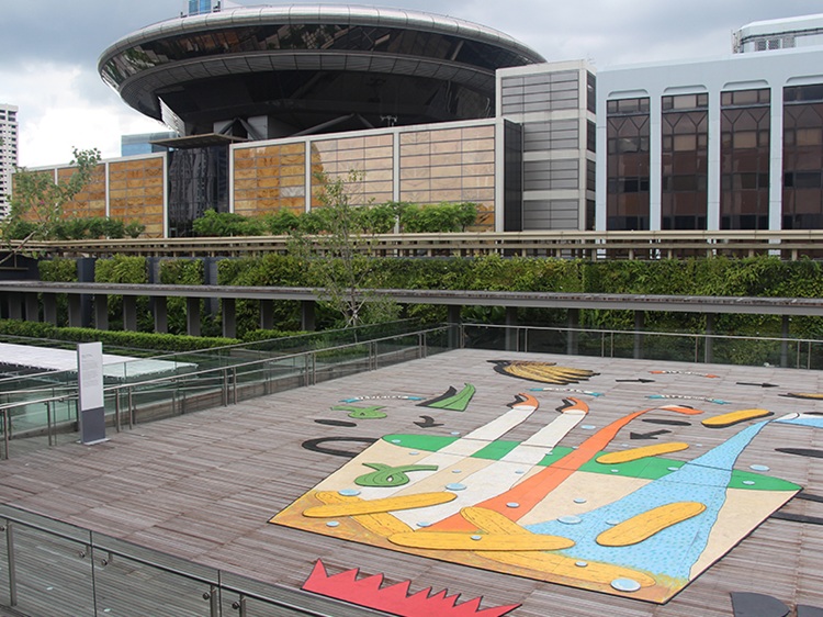 Balau timber decking on a rooftop terrace with lounge chairs